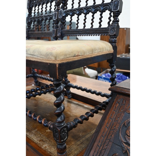 83 - A pair of 19th century carved oak hall chairs with barley twist spindles, supports and stretchers, g... 