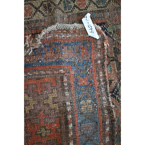 93 - Antique Kurdish runner of geometric design on red ground with repeating borders, very worn, 290 x 12... 