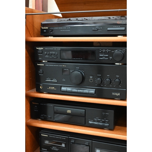 94 - A mid century 'Nathan' teak media cabinet containing Technics ST x302 LA Hi-Fi stack system (unteste... 