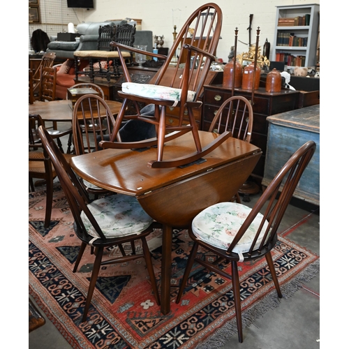 98 - An Ercol dark elm drop-leaf dining table, 110 cm x 124 cm x 70 cm h to/w four Windsor Quaker dining ... 