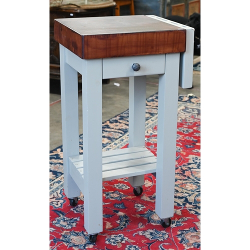 99 - A stained hardwood butcher's block on painted base with knife rack, drawer and slatted under tier, 5... 