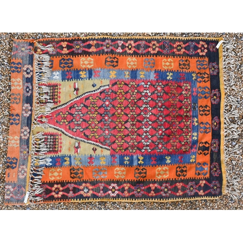 89 - An antique Turkish Cancun prayer kilim, one end folded and stitched a/f, 182 x 140 cm