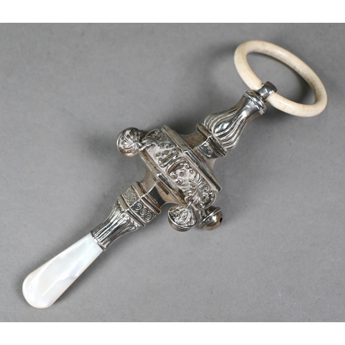 101 - A silver baby rattle in the Regency manner, with composite teething ring, square baluster body hang ... 