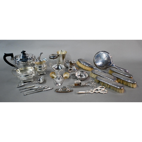 12 - Various silver oddments, including brushes and mirror, candlesticks and manicure part set, to/w elec... 