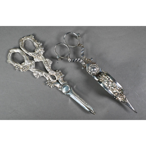 12 - Various silver oddments, including brushes and mirror, candlesticks and manicure part set, to/w elec... 