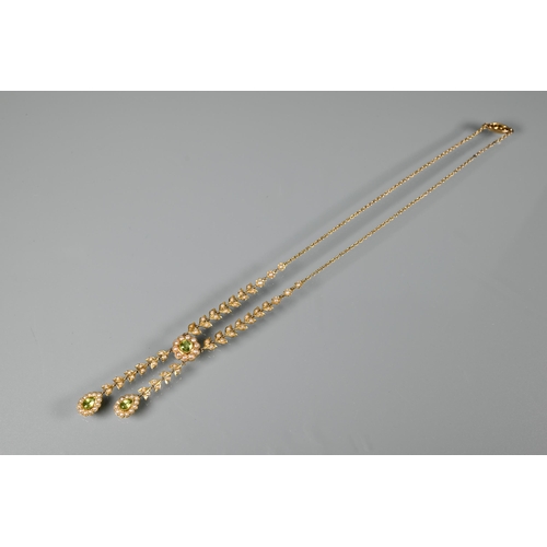 169 - An Edwardian 15ct yellow gold necklace set seed pearls and peridot and seed pearl clusters
