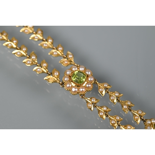 169 - An Edwardian 15ct yellow gold necklace set seed pearls and peridot and seed pearl clusters