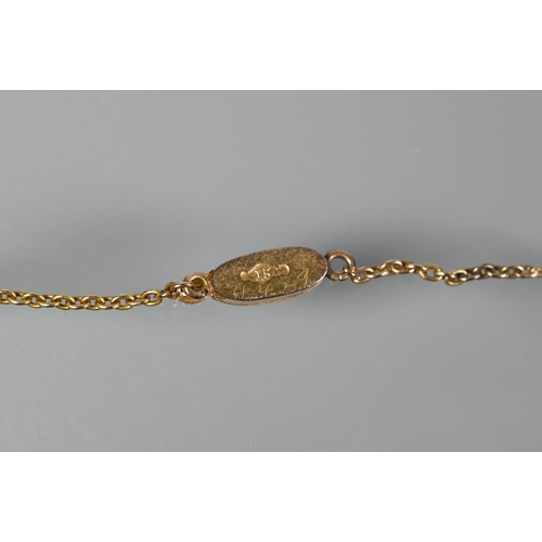 169 - An Edwardian 15ct yellow gold necklace set seed pearls and peridot and seed pearl clusters