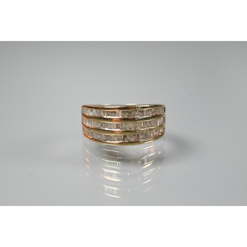 197 - A 9ct yellow gold ring set three rows of channel set diamonds, size O; a 9ct yellow gold signet ring... 