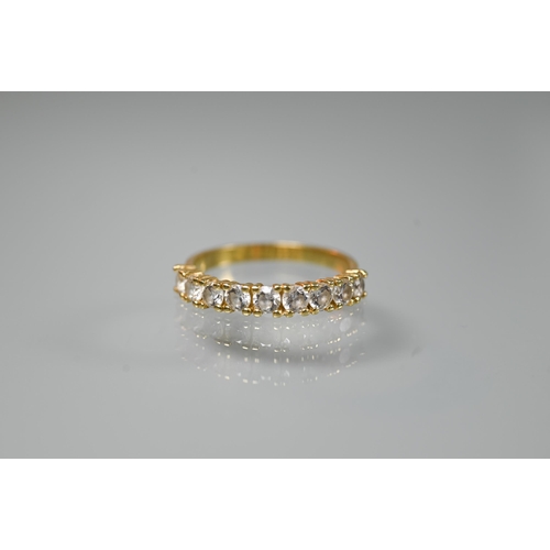 197 - A 9ct yellow gold ring set three rows of channel set diamonds, size O; a 9ct yellow gold signet ring... 