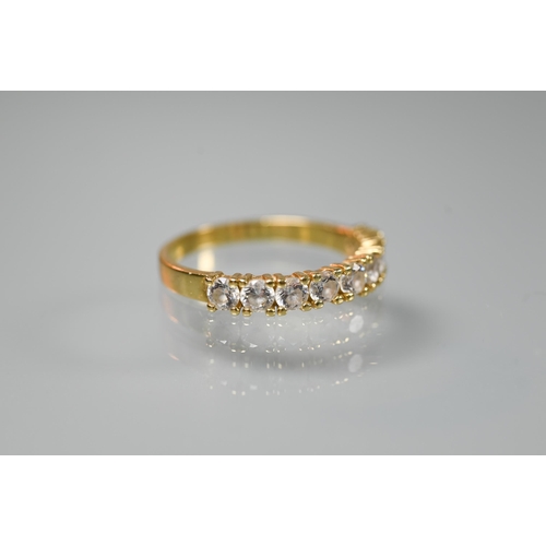 197 - A 9ct yellow gold ring set three rows of channel set diamonds, size O; a 9ct yellow gold signet ring... 