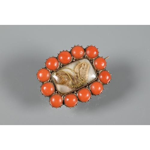 200 - A collection of mourning jewellery including oval chalcedony and hairwork brooch, coral and hairwork... 