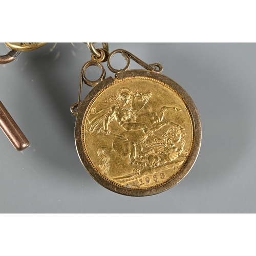 204 - A 1963 gold sovereign in 9ct scroll mount, on 9ct yellow gold part chain with 9ct rose gold bar atta... 