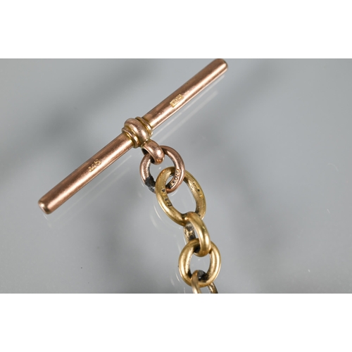 204 - A 1963 gold sovereign in 9ct scroll mount, on 9ct yellow gold part chain with 9ct rose gold bar atta... 