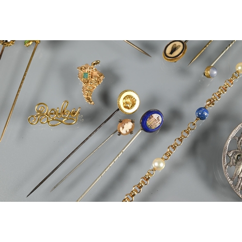 212 - A collection of nineteen antique and later stick pins including insect mosaic, star sapphire, enamel... 