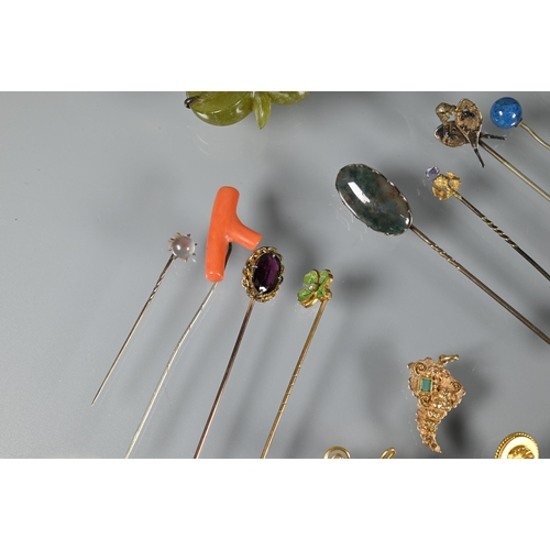 212 - A collection of nineteen antique and later stick pins including insect mosaic, star sapphire, enamel... 