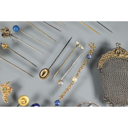 212 - A collection of nineteen antique and later stick pins including insect mosaic, star sapphire, enamel... 