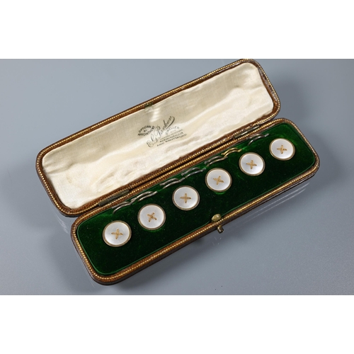 213 - A cased set of six 9ct yellow gold mother of pearl dress buttons to/w a cased set of six dress butto... 