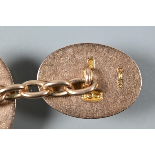 214 - A pair of 9ct yellow gold oval chain-linked cufflinks, 17.8g to/w a pair of rose gold oval cufflinks... 