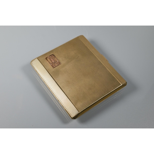 215 - A 9ct yellow gold cigarette case with engine turned decoration, applied monogram JMC and engraved wi... 