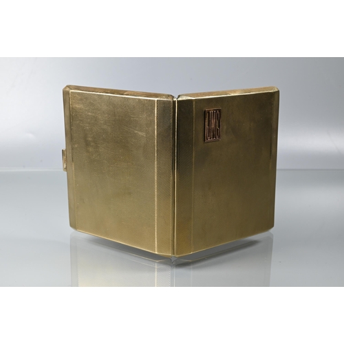 215 - A 9ct yellow gold cigarette case with engine turned decoration, applied monogram JMC and engraved wi... 