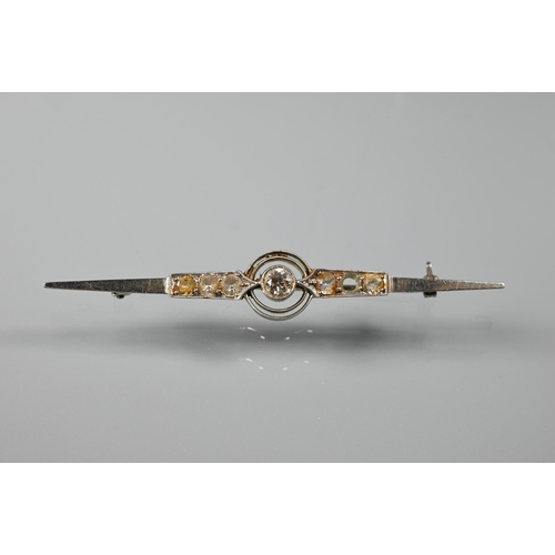 218 - A 1920s diamond set bar brooch, white metal stamped 18ct plat, 6 cm long, 4.2g all in (stone missing... 