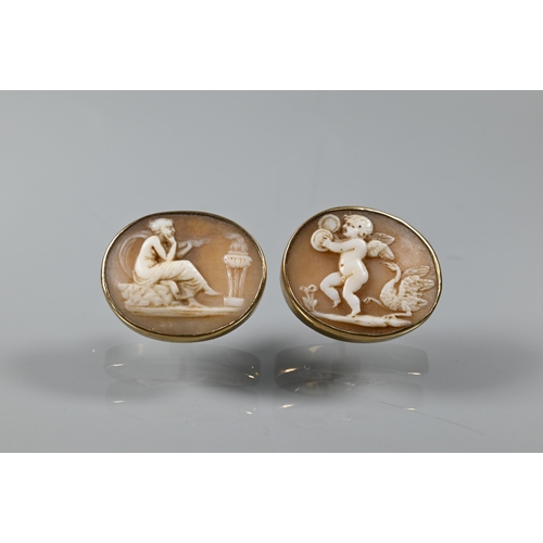 219 - A pair of cameo oval plaques featuring classical scenes, set as earrings in unmarked yellow metal to... 