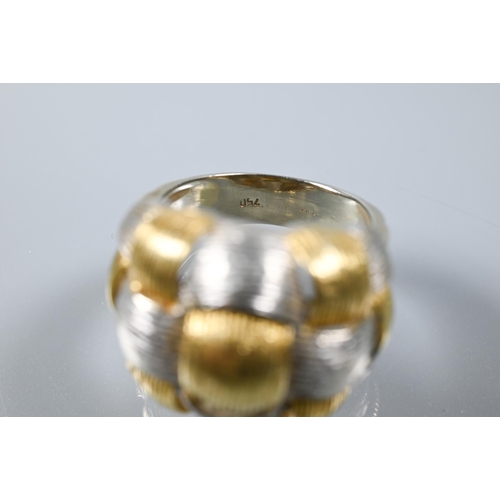 223 - A contemporary yellow and white metal ring of plaited design, stamped 750, size N, approx 8.7g