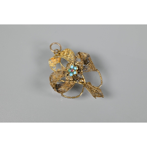 225 - An antique yellow metal filigree pendant, with central turquoise and garnet set cluster, a/f