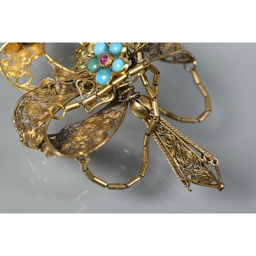 225 - An antique yellow metal filigree pendant, with central turquoise and garnet set cluster, a/f