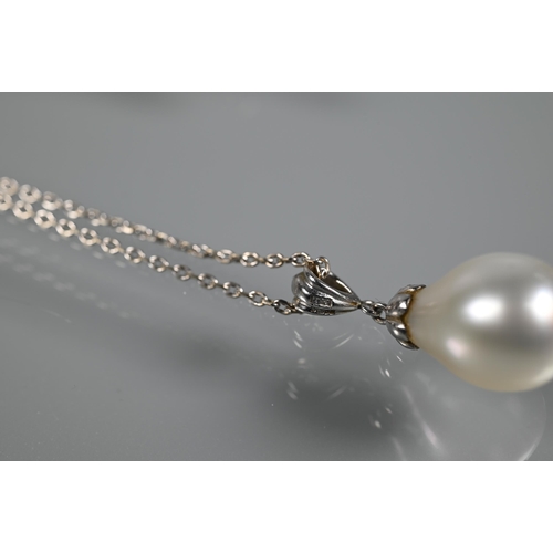 228 - A pear-shaped cultured pearl pendant on 18ct white gold fine belcher chain, 1cm diam to/w a pair of ... 