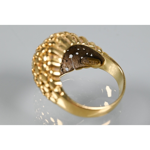 237 - A contemporary bombé ring of textured from, yellow metal stamped 750, size M, approx 7.5g