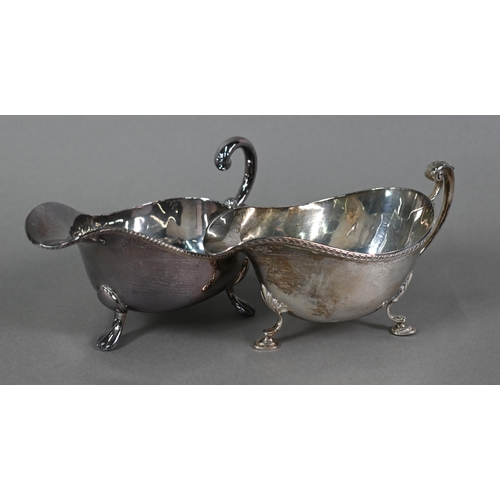 24 - A silver sauce boat on hoof feet, Birmingham 1935, to/w two cased sets of teaspoons and other silver... 