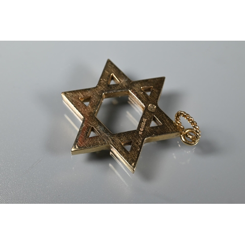 242 - A 9ct yellow gold Star of David pendant, approx 7.8g, 2.5 cm diam