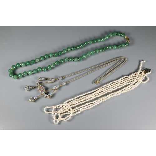 244 - A row of uniform jade beads, knotted onto yellow metal clasp marked silver; an Italian micro mosaic ... 