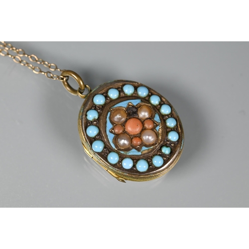 246 - A Victorian oval locket with chased decoration to reverse, the front set with turquoise, pearl and c... 