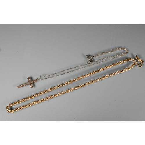 249 - A yellow metal rope twist length of chain, stamped 375, a cross stamped 9ct, and part earrings etc a... 