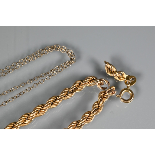 249 - A yellow metal rope twist length of chain, stamped 375, a cross stamped 9ct, and part earrings etc a... 