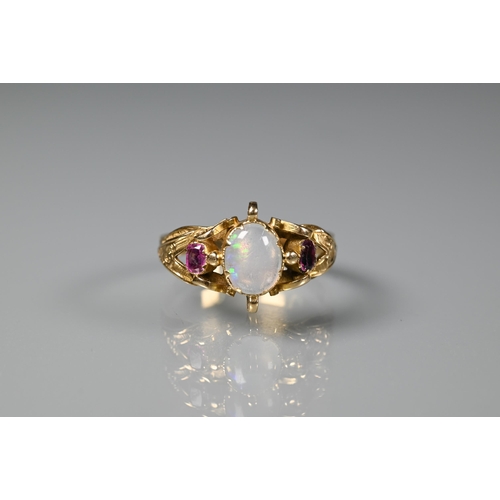 250 - An 18ct yellow gold ring 'Astore', size I to/w an antique opal and garnet ring, size M 1/2 (2)