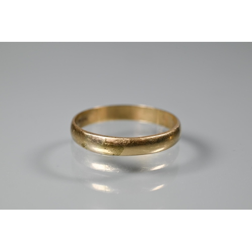 257 - Two yellow gold wedding bands, 18ct size N, 2.3g and 9ct size S (evidence of re-sizing), 2g