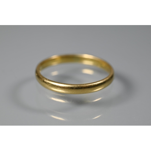 257 - Two yellow gold wedding bands, 18ct size N, 2.3g and 9ct size S (evidence of re-sizing), 2g