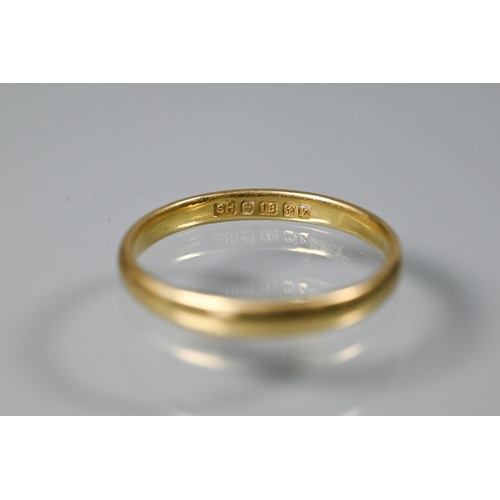 257 - Two yellow gold wedding bands, 18ct size N, 2.3g and 9ct size S (evidence of re-sizing), 2g