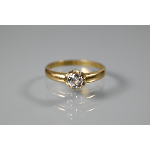 258 - A graduated three stone diamond ring, yellow metal set, size S and a single stone diamond ring, size... 