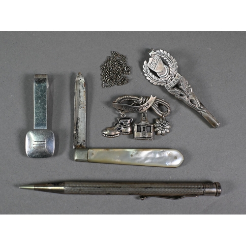 26 - A weighted silver 'Witchball' table lighter, William Comyns & Sons Ltd, London 1957, a cut glass... 