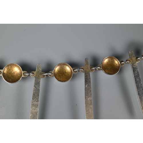 275 - David Andersen - A Norwegian silver-gilt and white enamel fringe necklace formed of alternate rounde... 