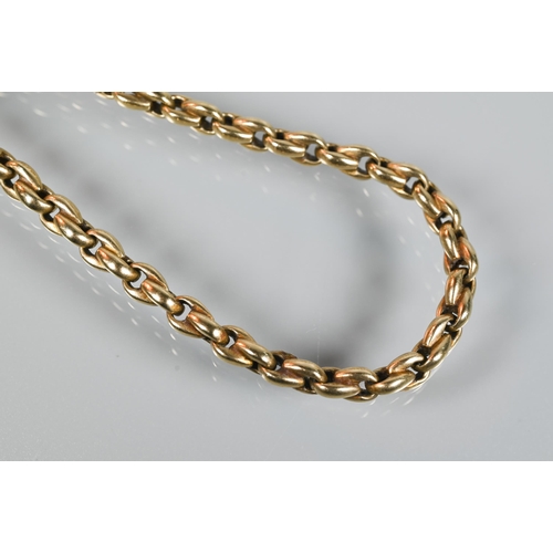 276 - A yellow gold curb link Albert chain, swivel marked 18ct, clasp marked for 9ct, 46 cm long (open), a... 