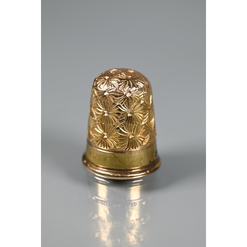 287A - A Victorian 15ct yellow gold thimble with chased decoration, 4.3g