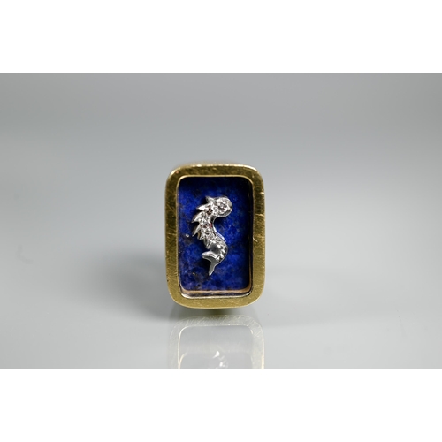 292 - Andrew Grima (1921-2007) - An 18ct textured and bloomed ring with lapis lazuli plaque with diamond-s... 