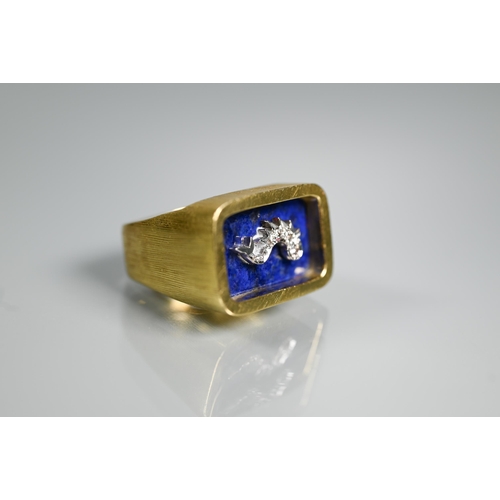 292 - Andrew Grima (1921-2007) - An 18ct textured and bloomed ring with lapis lazuli plaque with diamond-s... 