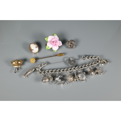 294A - Four various brooches - a 9ct yellow gold coronet brooch (3.4g), a white metal naval lapel badge, a ... 